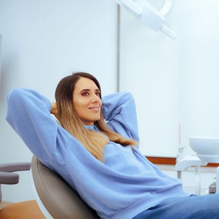 Relaxed patient in dental treatment chair