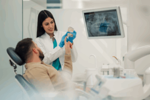 an endodontist chatting with her patient